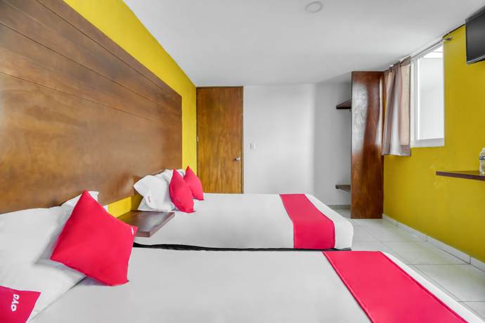 Imagen de la habitación del Hotel OYO Familiar Tollan. Foto 15