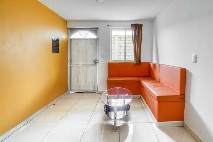Imagen de la habitación del Hotel OYO Familiar Tollan. Foto 16