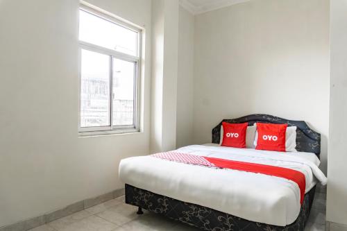 Imagen de la habitación del Hotel OYO Family Inn. Foto 20