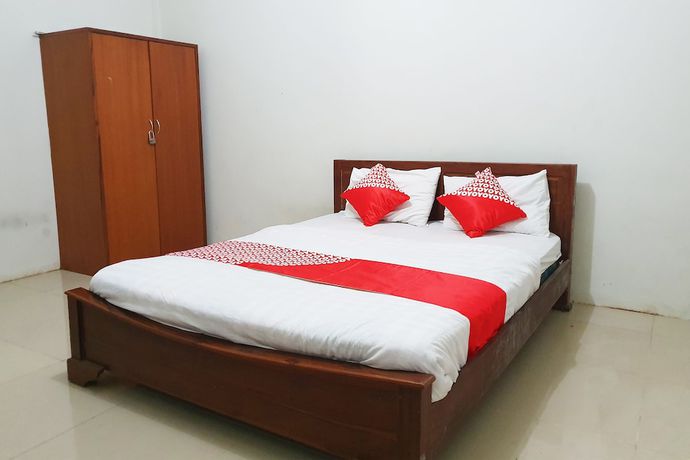 Imagen de la habitación del Hotel OYO Flagship 1034 Pondok Mulia Guest House Syariah. Foto 5