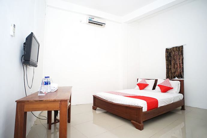Imagen de la habitación del Hotel OYO Flagship 1034 Pondok Mulia Guest House Syariah. Foto 8