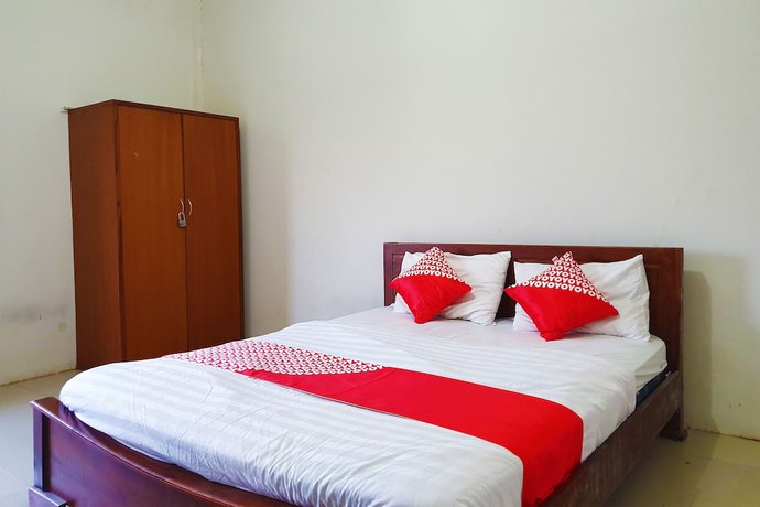 Imagen de la habitación del Hotel OYO Flagship 1034 Pondok Mulia Guest House Syariah. Foto 11