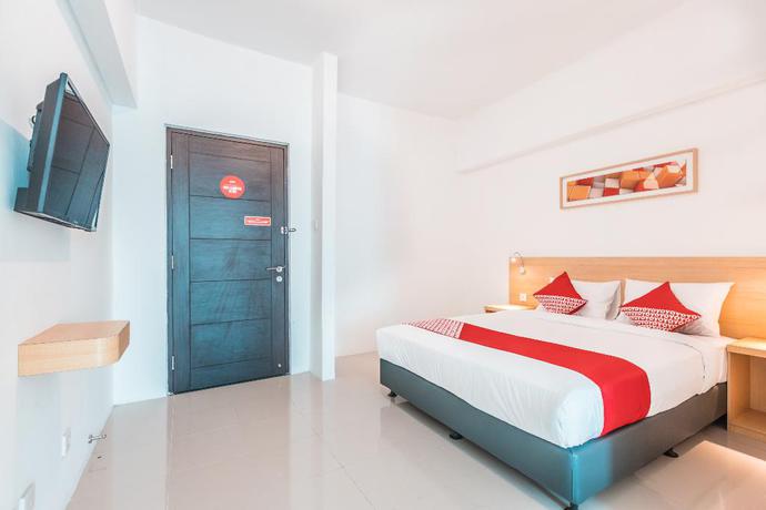 Imagen de la habitación del Hotel OYO Flagship 1170 The Habitat Karawaci. Foto 10