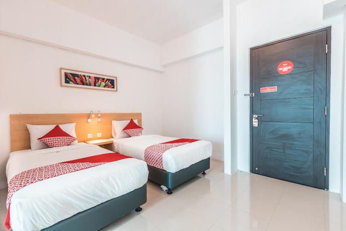 Imagen de la habitación del Hotel OYO Flagship 1170 The Habitat Karawaci. Foto 12