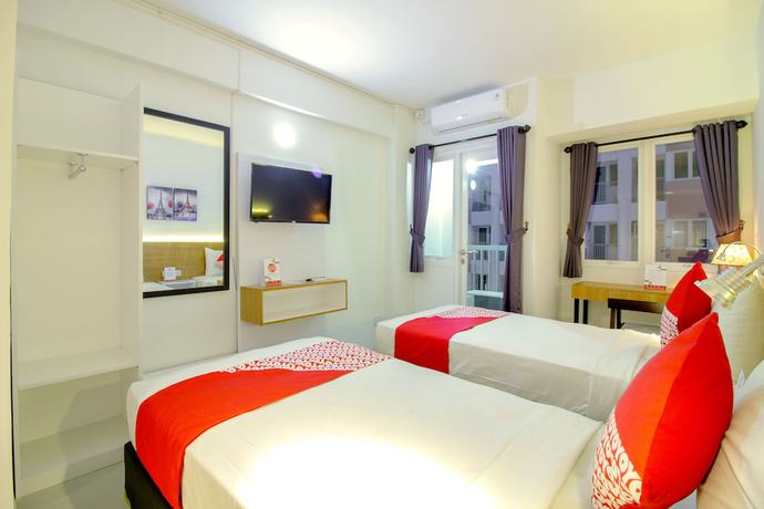 Imagen de la habitación del Hotel OYO Flagship 1260 Sentraland Karawang. Foto 6