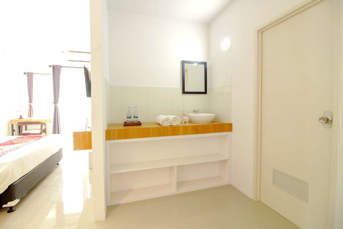 Imagen de la habitación del Hotel OYO Flagship 1260 Sentraland Karawang. Foto 14