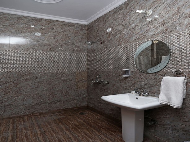 Imagen de la habitación del Hotel OYO Flagship 14625 Baani Abode. Foto 16