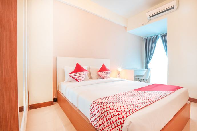 Imagen de la habitación del Hotel OYO Flagship 755 Appartel Grand Dhika City. Foto 3