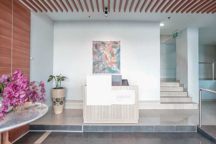 Imagen de los interiores del Hotel OYO Flagship 755 Appartel Grand Dhika City. Foto 17