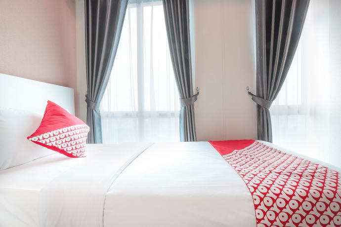 Imagen de la habitación del Hotel OYO Flagship 755 Appartel Grand Dhika City. Foto 5