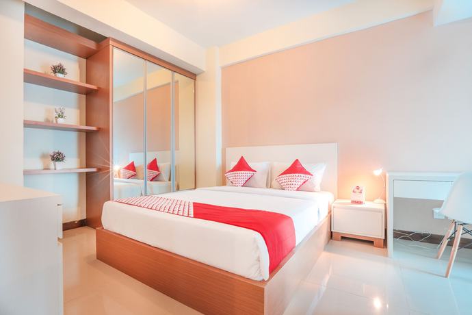 Imagen de la habitación del Hotel OYO Flagship 755 Appartel Grand Dhika City. Foto 6