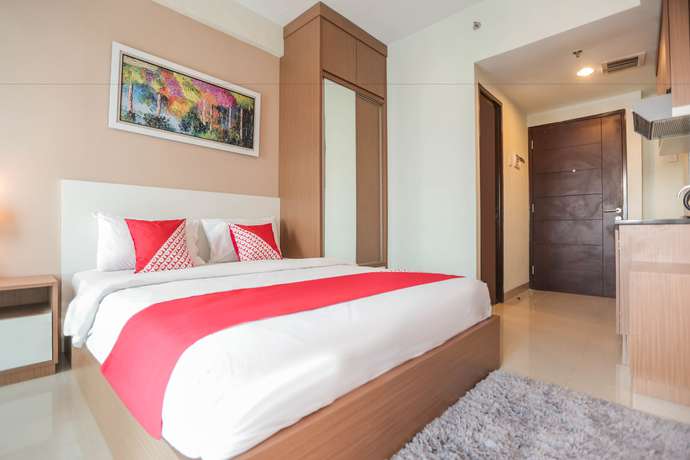 Imagen de la habitación del Hotel OYO Flagship 755 Appartel Grand Dhika City. Foto 7