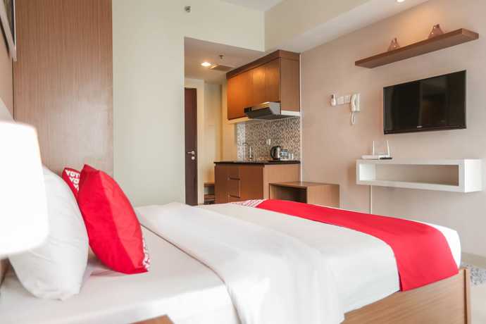 Imagen de la habitación del Hotel OYO Flagship 755 Appartel Grand Dhika City. Foto 9