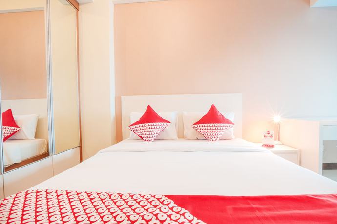 Imagen de la habitación del Hotel OYO Flagship 755 Appartel Grand Dhika City. Foto 10
