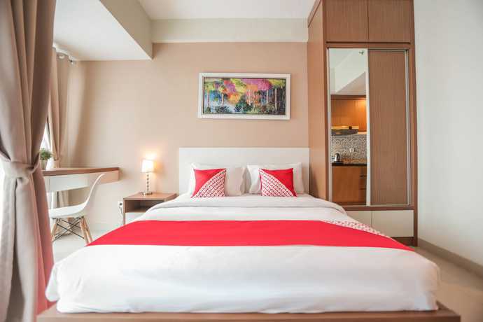 Imagen de la habitación del Hotel OYO Flagship 755 Appartel Grand Dhika City. Foto 11