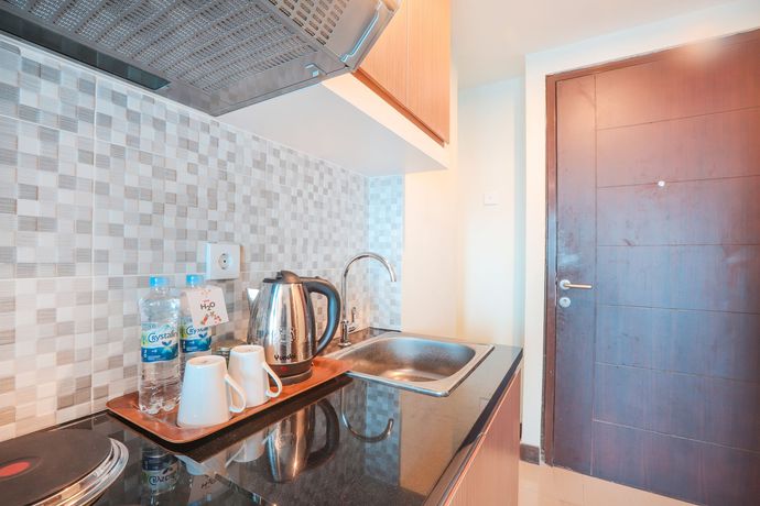 Imagen de la habitación del Hotel OYO Flagship 755 Appartel Grand Dhika City. Foto 15