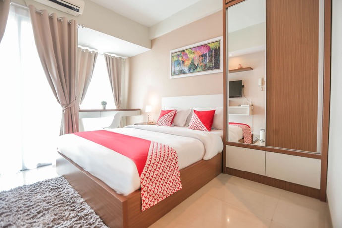Imagen de la habitación del Hotel OYO Flagship 755 Appartel Grand Dhika City. Foto 16