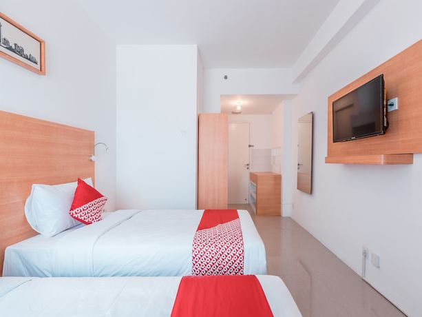 Imagen de la habitación del Hotel OYO Flagship 766 Prima Orchard. Foto 9