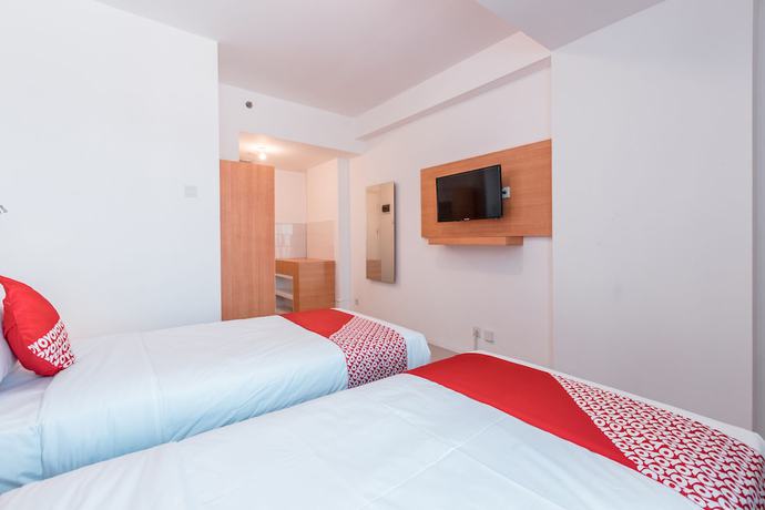 Imagen de la habitación del Hotel OYO Flagship 766 Prima Orchard. Foto 10