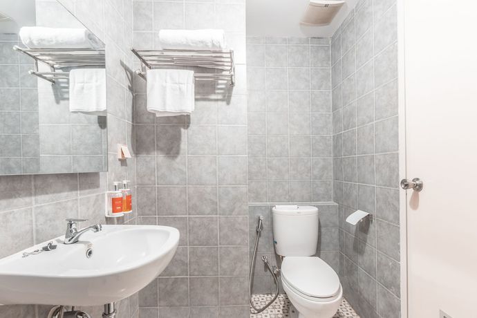 Imagen de la habitación del Hotel OYO Flagship 766 Prima Orchard. Foto 12