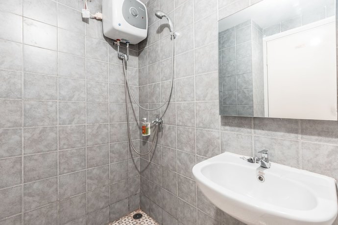 Imagen de la habitación del Hotel OYO Flagship 766 Prima Orchard. Foto 13