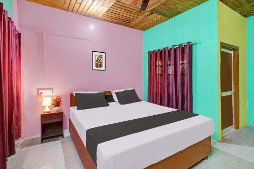 Imagen de la habitación del Hotel OYO Flagship Heritage Nest Resort Kazirnga. Foto 20