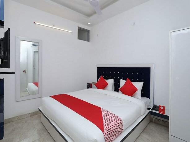 Imagen de la habitación del Hotel OYO Flagship Hotel Uk-07. Foto 2