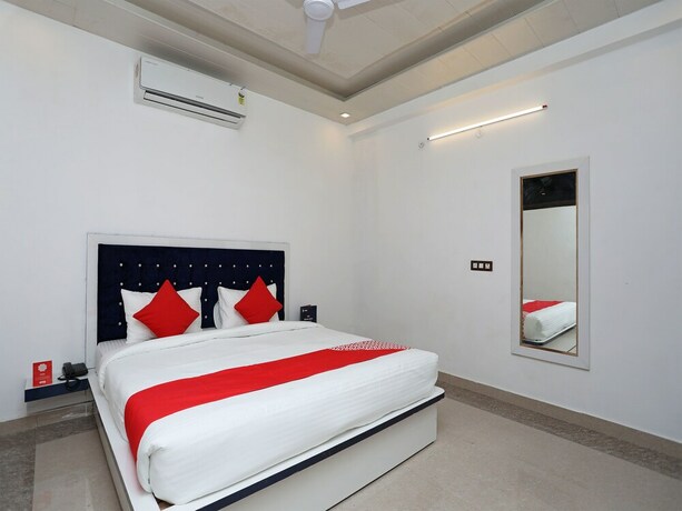 Imagen de la habitación del Hotel OYO Flagship Hotel Uk-07. Foto 7