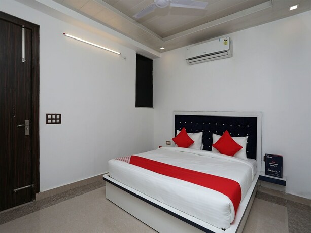 Imagen de la habitación del Hotel OYO Flagship Hotel Uk-07. Foto 8