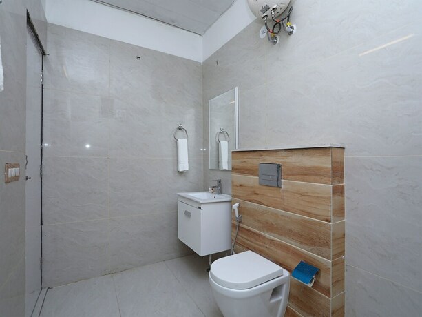 Imagen de la habitación del Hotel OYO Flagship Hotel Uk-07. Foto 9
