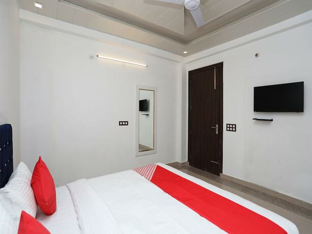 Imagen de la habitación del Hotel OYO Flagship Hotel Uk-07. Foto 10