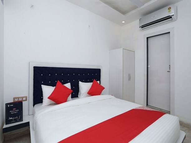 Imagen de la habitación del Hotel OYO Flagship Hotel Uk-07. Foto 11