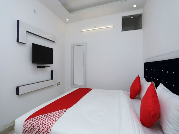 Imagen de la habitación del Hotel OYO Flagship Hotel Uk-07. Foto 12