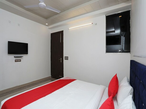 Imagen de la habitación del Hotel OYO Flagship Hotel Uk-07. Foto 13