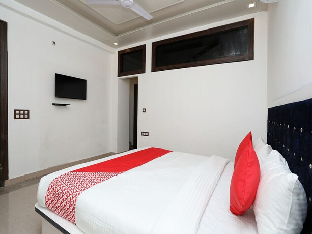 Imagen de la habitación del Hotel OYO Flagship Hotel Uk-07. Foto 14