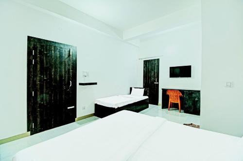 Imagen general del Hotel OYO Flagship JIBANALAYA Homestay. Foto 8