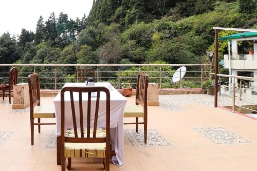 Imagen general del Hotel OYO Flagship Kavi Home Stay. Foto 4