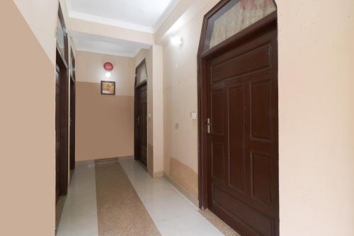 Imagen general del Hotel OYO Flagship Kavi Home Stay. Foto 6