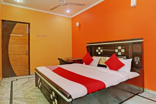 Imagen de la habitación del Hotel OYO Flagship Naveen Stay 2. Foto 20