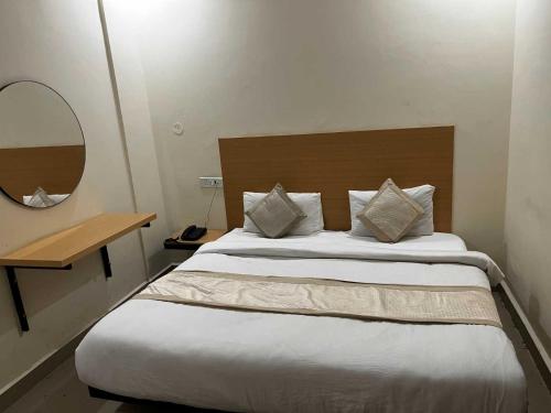 Imagen de la habitación del Hotel OYO Flagship T R Resort. Foto 9