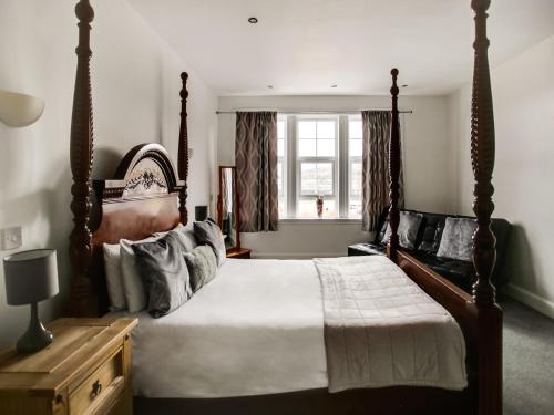 Imagen de la habitación del Hotel OYO Gin House. Foto 8