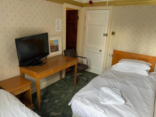 Imagen de la habitación del Hotel OYO Great White Horse. Foto 16
