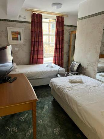 Imagen de la habitación del Hotel OYO Great White Horse. Foto 20