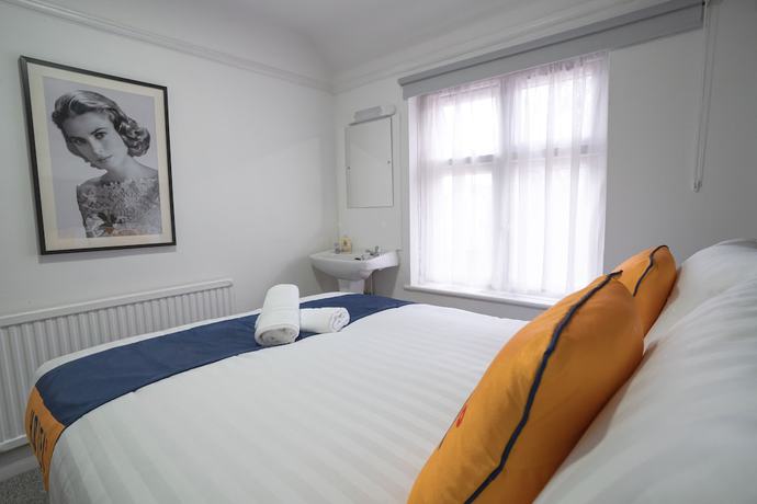 Imagen de la habitación del Hotel OYO Greenway Stays. Foto 4