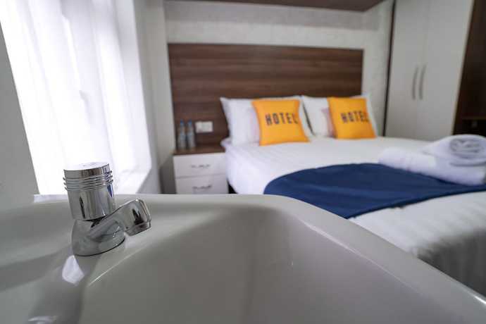 Imagen de la habitación del Hotel OYO Greenway Stays. Foto 5