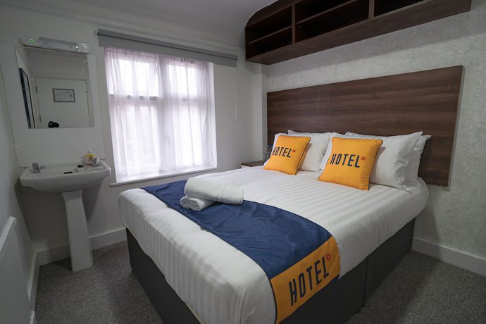 Imagen de la habitación del Hotel OYO Greenway Stays. Foto 6