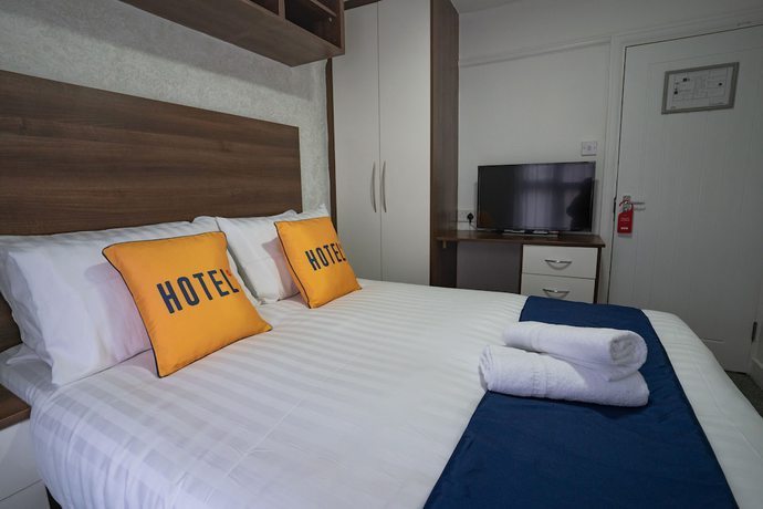 Imagen de la habitación del Hotel OYO Greenway Stays. Foto 8