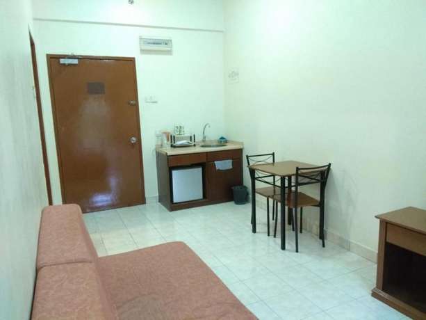 Imagen de la habitación del Hotel OYO HOME 90301 Suria Service Apartments @ Bukit Merak Laketown Resort. Foto 8