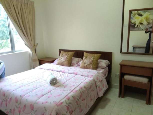 Imagen de la habitación del Hotel OYO HOME 90301 Suria Service Apartments @ Bukit Merak Laketown Resort. Foto 11