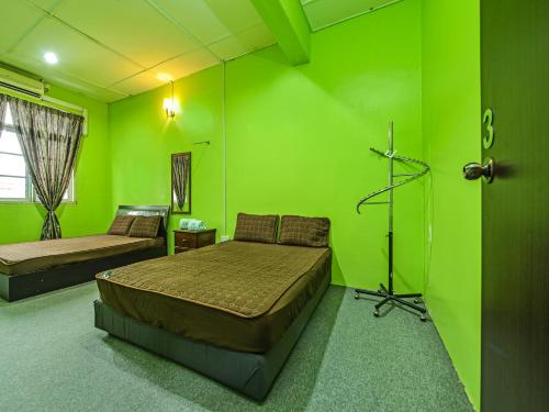 Imagen general del Hotel OYO HOME 90325 Au Homestay. Foto 4